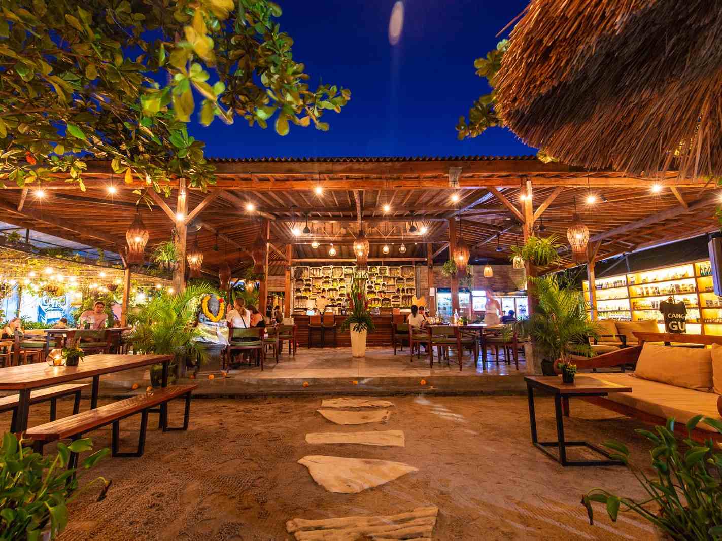 Cafe interior with tropical lounge vibes